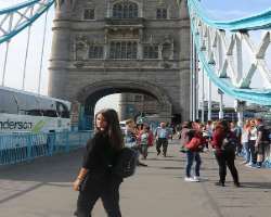 She is a travel enthusiast and went to see Tower Bridge in London.